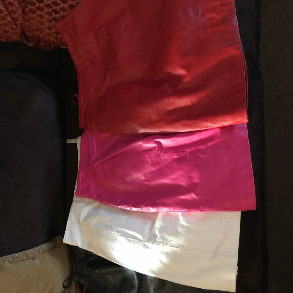 4 like new leather mini skirts. Like new.